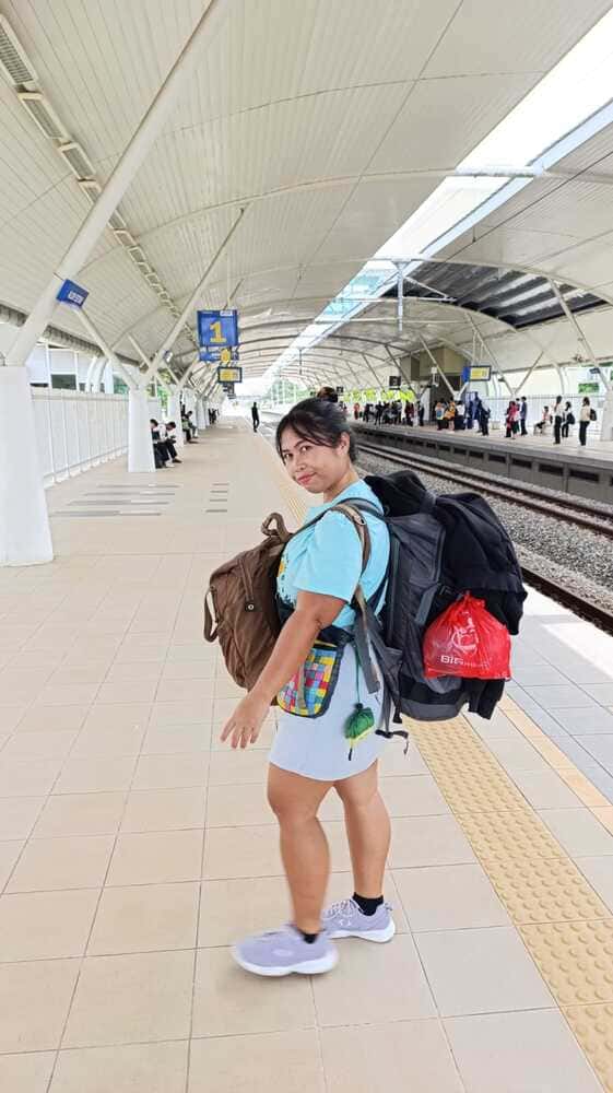 Traveler standing at Alor Setar Railway Station before taking the train to Padang Besar.